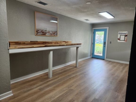 Empty room with a table at The Fountains at Deerwood, Jacksonville, FL, 32256