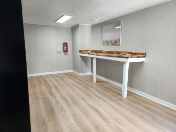 Empty room with a table at The Fountains at Deerwood, Jacksonville, FL, 32256