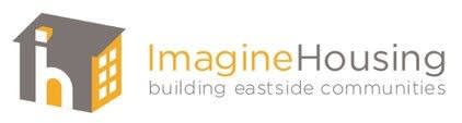 A logo for Imagine Housing that includes a house and text.