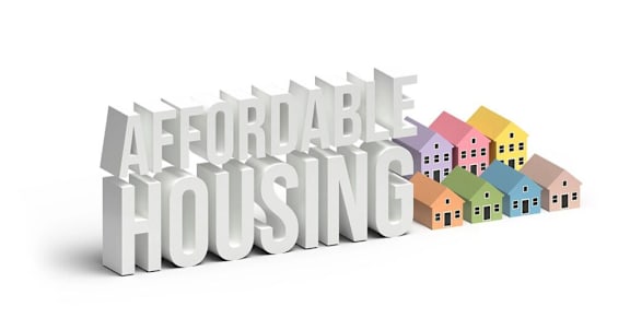 A 3D text that reads "Affordable Housing" with a row of colorful houses beneath it.