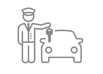 Floor Plan  A line drawing of a person handing a car key to another person.