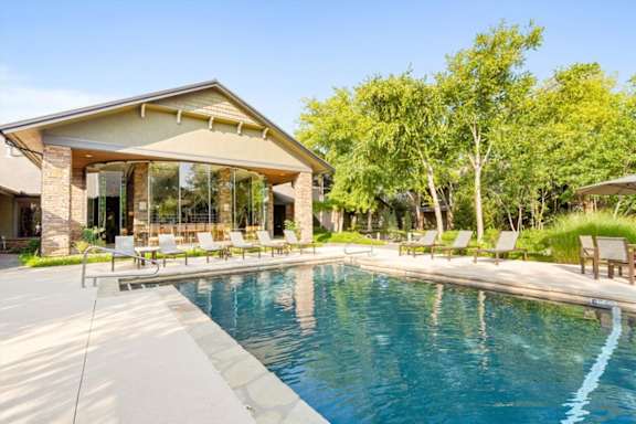 Pool in the backyard at Deer Creek Apartment Homes, Overland Park