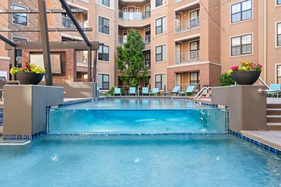 Tiered Pool with Tanning Deck at 46 Penn Apartment Homes, MO, 64111