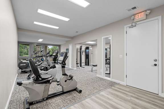 The gym at Millcreek Woods Apartments in Olathe, KS