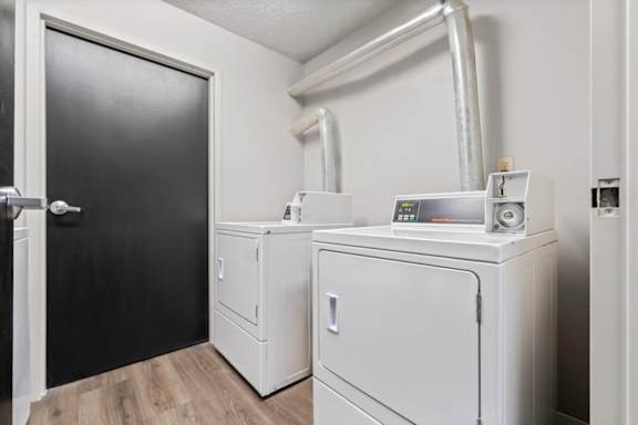 Small Laundry room at Cloverset Active Adult Apartments, Missouri
