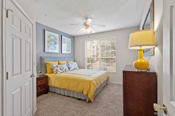 a bedroom with a bed and a ceiling fan at Claremont, Kansas, 66210