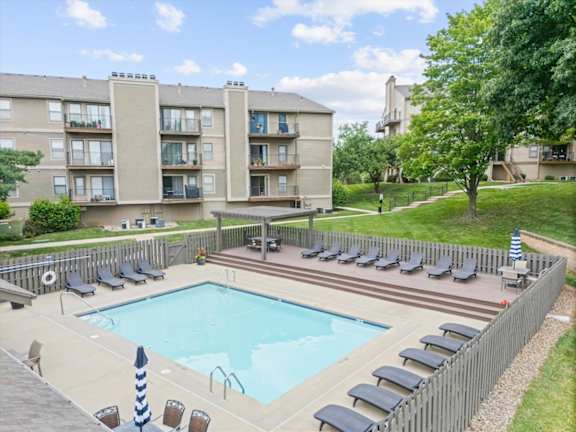 Outdoor swimming pool view at Cloverset Active Adult Apartments, Kansas City, 64114