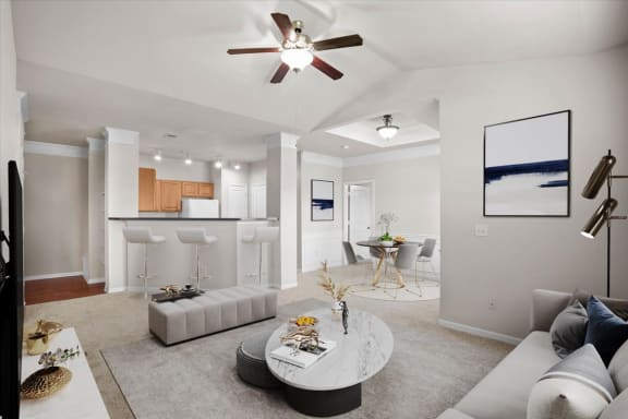 an open living room with a kitchen and a ceiling fan at Stonepost Ranch, Kansas, 66221