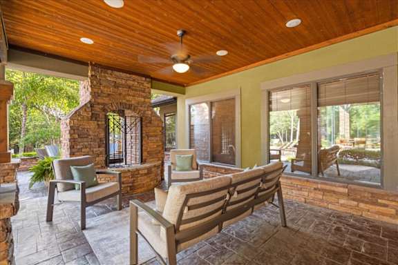 Covered Patio with fireplace at Deer Creek Apartment Homes, Kansas, 66213