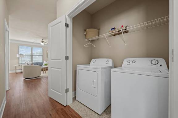 A laundry room with a washer and dryer.