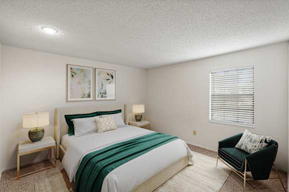 A primary bedroom with a window.