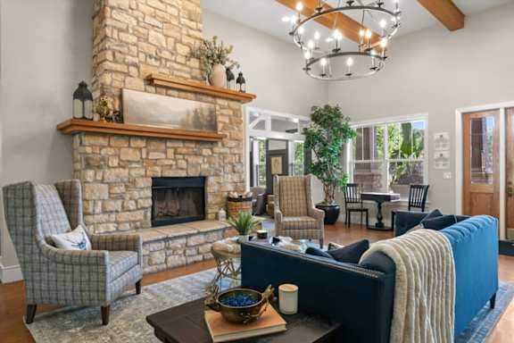 Clubroom With Fireplace at Stonepost Lakeside Apartment Homes, Olathe, KS, 66062