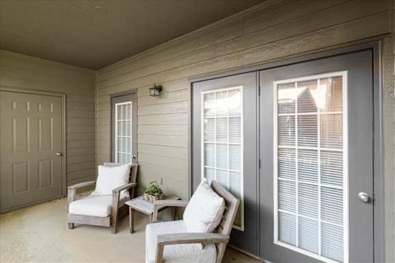 Lavish Private Patios with comfortable chairs at Deer Creek Apartment Homes, Overland Park, 66213