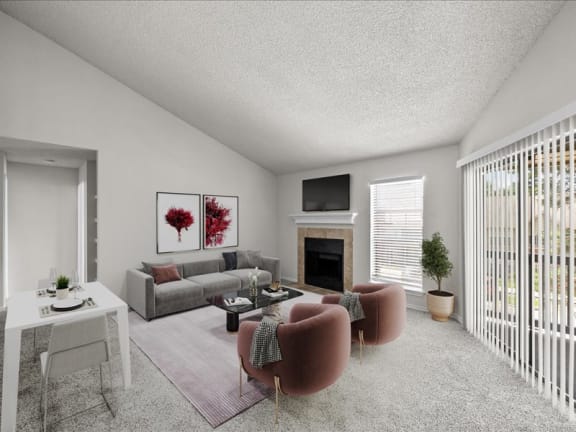 a living room filled with furniture and a fireplace
