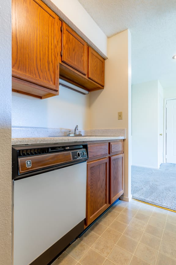 Kitchen gallery with wooden cabinet3 at Coventry Oaks Apartments, Overland Park, KS, 66214