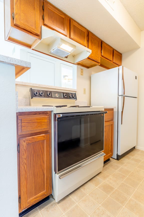 Kitchen gallery with wooden cabinet4 at Coventry Oaks Apartments, Overland Park, KS