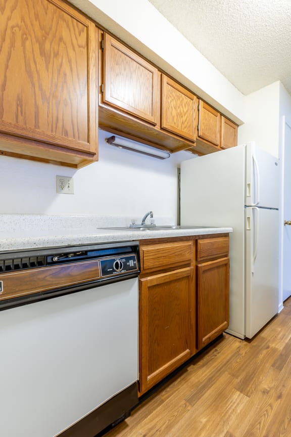 Kitchen counter tops and cabinets at Coventry Oaks Apartments, Overland Park, KS