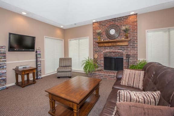 Living room fire place and tv at Coventry Oaks Apartments, Overland Park, 66214