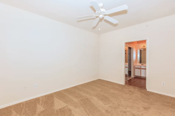 Wooden flooring bedroom with ceiling fan and light at Crescent, Lenexa, 66219