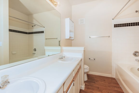 Bathroom with cabinets at Crescent, Lenexa, Kansas