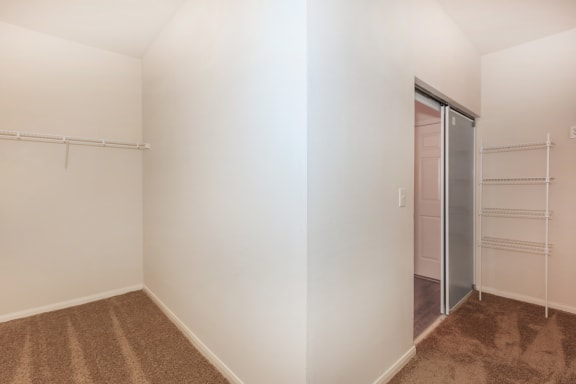 Bedroom with walk in closet at Crescent, Lenexa