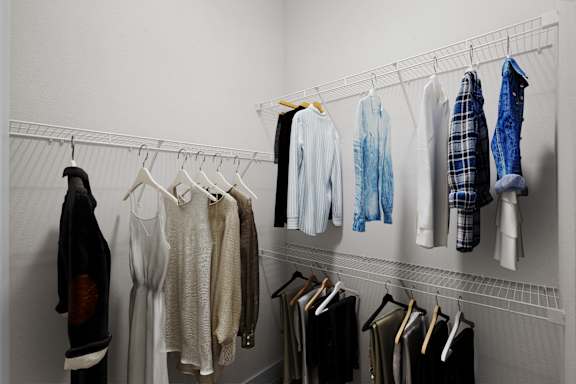 Clothes hanging on a clothes rack at West 39th Street Apartments, Kansas City, MO, 64111