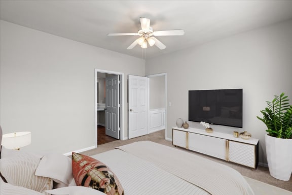 a bedroom with a bed and a ceiling fan