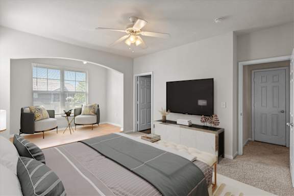 Luxurious bedroom with TV at Deer Creek Apartment Homes, Kansas, 66213