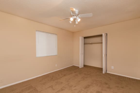 Unfurnished apartment bedroom with closetat Preston Court Apartments, Kansas, 66212