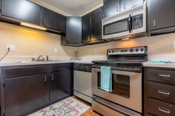 Kitchen with steel appliances1at Preston Court Apartments, Overland Park, KS, 66212