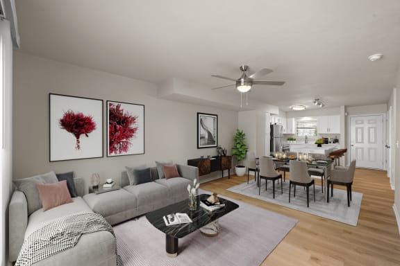 a living room and dining room with a couch and a table