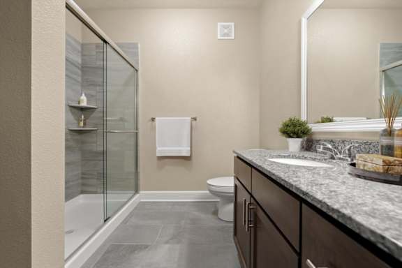 Bathroom with glass separated shower at The Residences at Bluhawk Apartments, Overland Park, KS, 66085