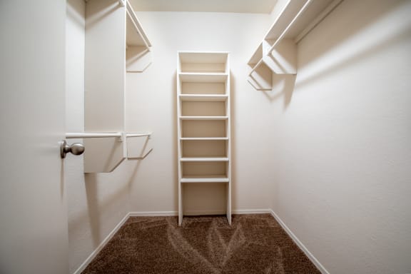 Built-In Shelving In Closet at Waterford Place Apartments & Townhomes, Kansas, 66210