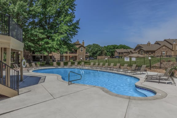 Pool Side Relaxing Area With Sundeck at Waterford Place Apartments & Townhomes, Overland Park, KS, 66210
