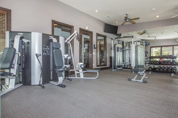modern fitness center at Ovation at Lewisville Apartments, Texas