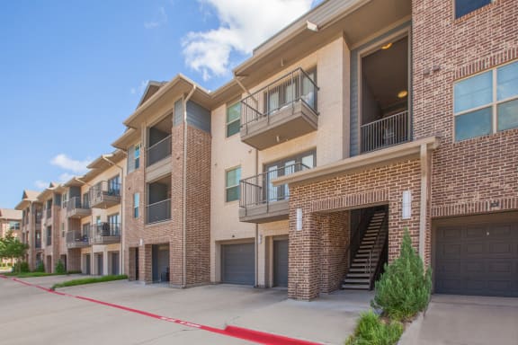 apartment building exterior at Ovation at Lewisville Apartments, Lewisville, 75067