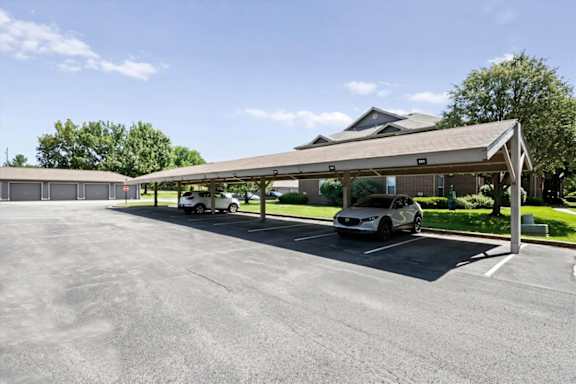 Covered parking: carports and detached garages at Creekside Apartments in Overland Park, KS