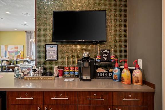 Complimentary coffee bar at Creekside Apartments in Overland Park, KS