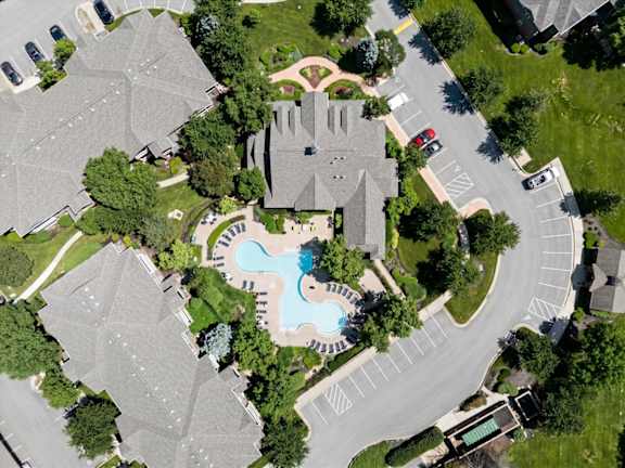 Shimmering outdoor swimming pool at Creekside Apartments in Overland Park, KS