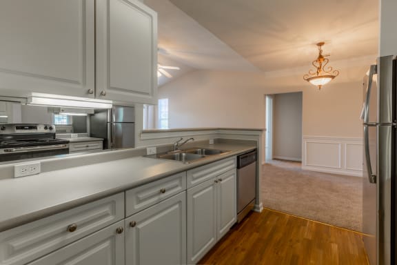 Kitchen area with appliances and cabinets2 at Wynnewood Farms Apartments, Overland Park, KS