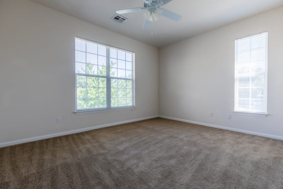 Wooden flooring room with 2 window at Wynnewood Farms Apartments, Overland Park, 66209