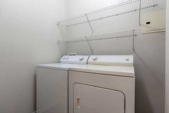 Laundry space at Wynnewood Farms Apartments, Overland Park, 66209