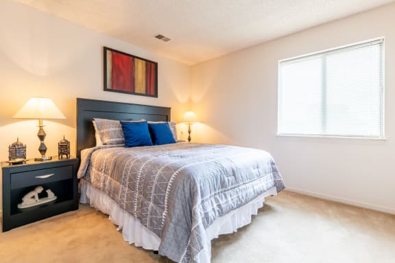 Beautiful Bright Bedroom With Wide Windows at Millcreek Woods Apartments, Kansas