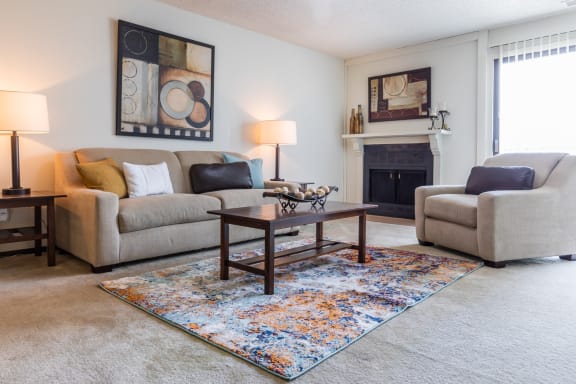 Living room with couchat Cloverset Valley Apartments, Kansas City