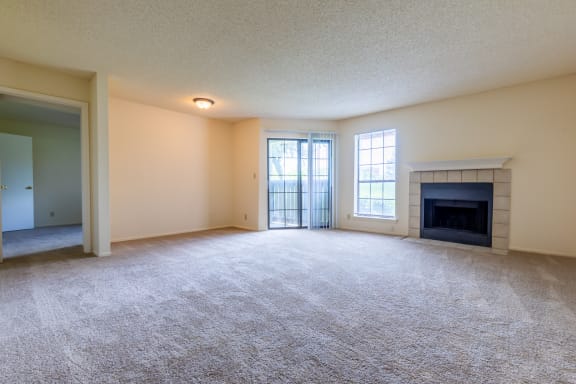 Carpeted Living Space at Coventry Oaks Apartments, Overland Park, KS, 66214