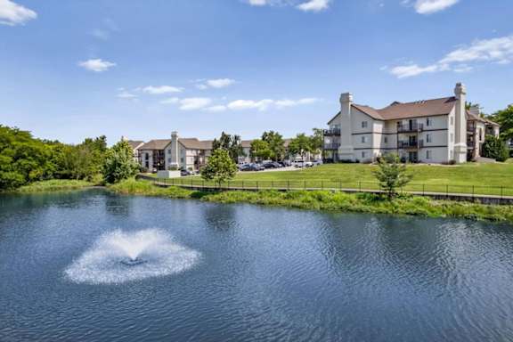Lakefront apartment homes overlooking the community fountain and walking trail.