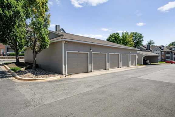 Row of detached garages at Stonebriar Apartments community in Overland Park KS