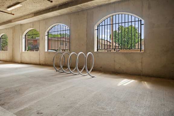 Bike racks at The Dorset located in covered parking area for convenient bicycle storage
