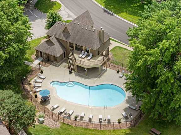An aerial view of the Waterford Place Apartments & Townhomes clubhouse pool.