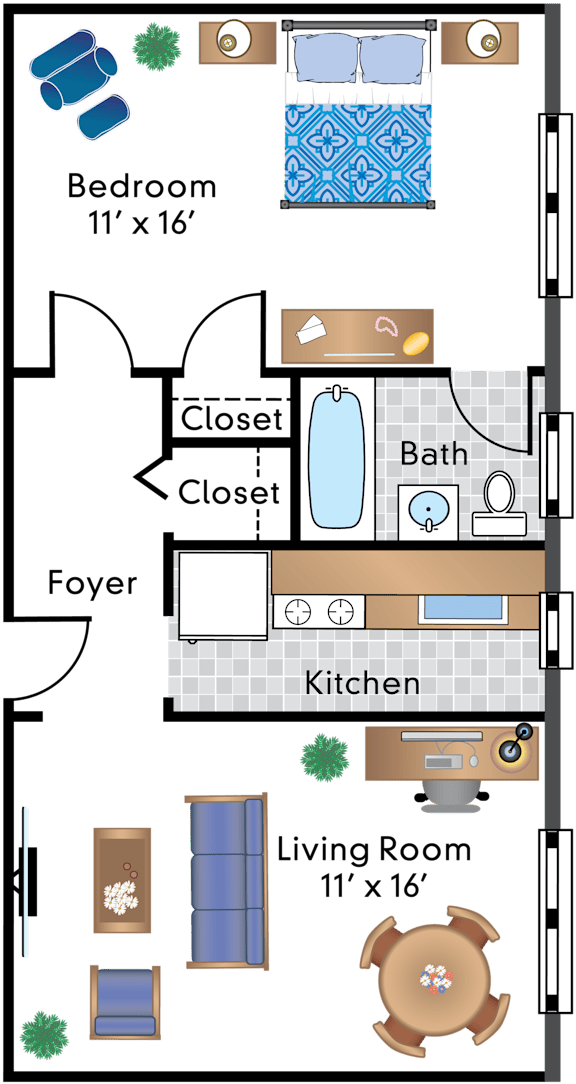 A floor plan of a small apartment with a bedroom, living room, kitchen, and bathroom.